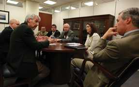 At left Thomas Bledsoe FACP explains the concerns of Rhode Island ACP members to Sen Sheldon Whitehouse Photos by Rick Reinhard