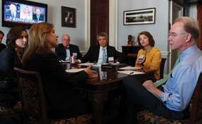 Jennifer E Zora ACP Student Member tells Rep Tom Price about primary cares importance as other members of ACPs Georgia chapter look on Center is former ACP president Joseph W Stubbs MACP