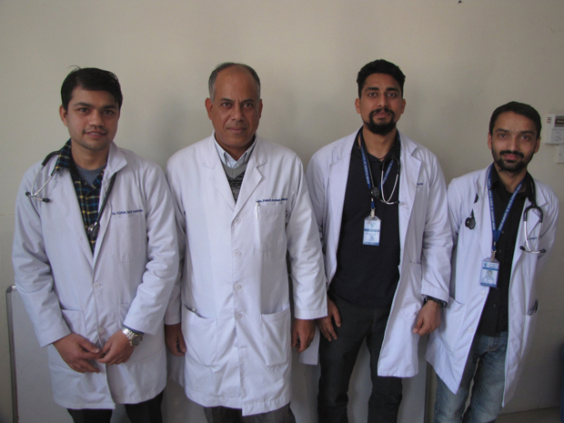 Program director Paras Acharya MD second from left stands with Patan Academy of Health Sciences first group of internal medicine residents from left Ajaya Raj Gautam MBBS Abhishek Tiwary MBB